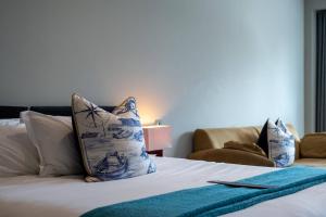 Cama ou camas em um quarto em Captain's Club Hotel & Spa