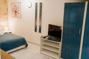 Postel nebo postele na pokoji v ubytování Villa Palma