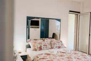 Postel nebo postele na pokoji v ubytování Villa Palma