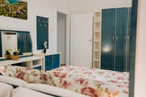 Postel nebo postele na pokoji v ubytování Villa Palma