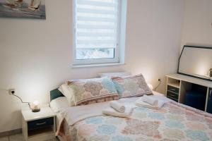 Postel nebo postele na pokoji v ubytování Villa Palma