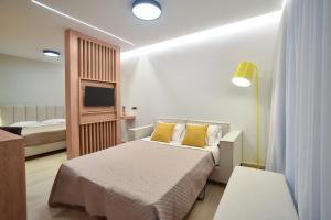 Postel nebo postele na pokoji v ubytování Almy Beach Hotel