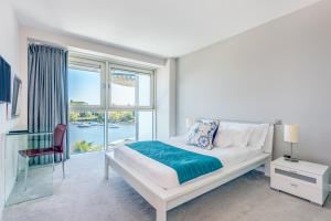 Cama ou camas em um quarto em Captain's Club Hotel & Spa