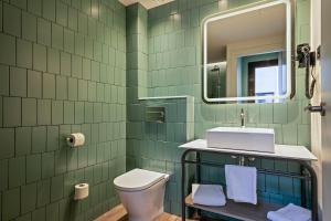 Koupelna v ubytování Hotel Via Augusta