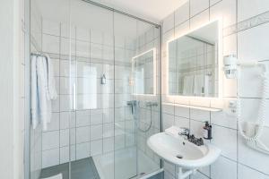 Koupelna v ubytování Hotel Artist