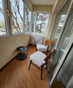 Khu vực ghế ngồi tại Cristina Luxury Apartment