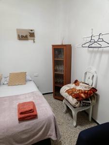 Кровать или кровати в номере Double room in La Isleta, 100 meters from Las Canteras beach