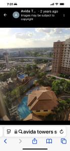 een screenshot van aedia website met een foto van een resort bij Avida sm sucat condotel in Manilla