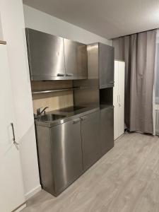 Dapur atau dapur kecil di Primestay Studios Parking Wifi Kitchen +40 gambar