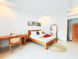 Postel nebo postele na pokoji v ubytování Bali intan Canggu