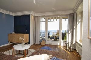 Posezení v ubytování Ferienwohnung mit traumhaftem Meerblick - Haus am Meer FeWo 04