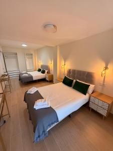 Ένα ή περισσότερα κρεβάτια σε δωμάτιο στο Ola Málaga