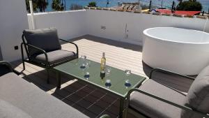 A balcony or terrace at 2 Mijas Playa Club in La Cala de Mijas