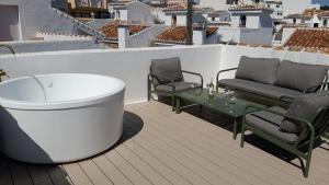 A seating area at 2 Mijas Playa Club in La Cala de Mijas