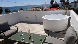 A balcony or terrace at 2 Mijas Playa Club in La Cala de Mijas