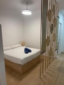 a bedroom with a bed in a room at guadiaro studio in Málaga