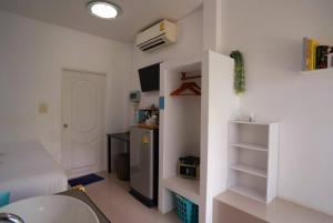Postel nebo postele na pokoji v ubytování Phannarai House
