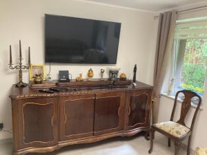 Televisyen dan/atau pusat hiburan di Apartament