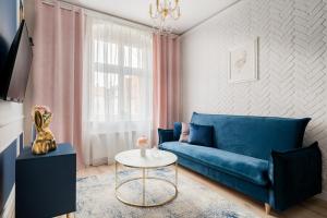Χώρος καθιστικού στο Klimatyzowane Apartamenty Stary Toruń by Rentoom