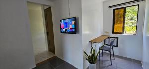 TV a/nebo společenská místnost v ubytování Vhora Resort