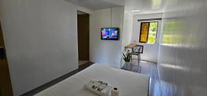 TV a/nebo společenská místnost v ubytování Vhora Resort