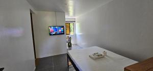TV a/nebo společenská místnost v ubytování Vhora Resort