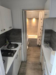 Kuchyň nebo kuchyňský kout v ubytování Apartament Gwiezdny