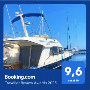 a boat is docked in a marina at Seacascais, Lda in Cascais