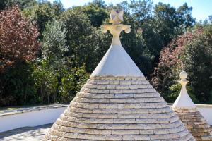 a roof with a star on top of it at Villa Leonardo Luxury Locorotondo in Locorotondo