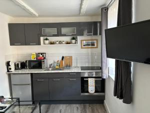 Η κουζίνα ή μικρή κουζίνα στο West street home