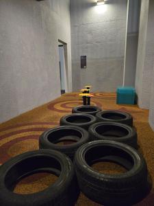 a group of tires on the floor in a room at Trion Kuala Lumpur For KLCC view BLOCK C in Kuala Lumpur