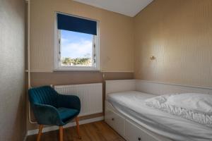 Postel nebo postele na pokoji v ubytování Vakantiehuis Pico Bello - Callantsoog aan Zee