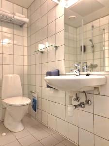 Koupelna v ubytování City Living Sentrum Hotel + 20 fotografií