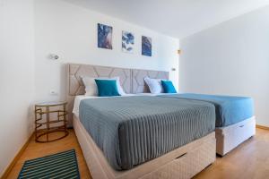 Postel nebo postele na pokoji v ubytování Villa Azzurro with Private Beach