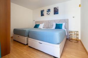 Postel nebo postele na pokoji v ubytování Villa Azzurro with Private Beach