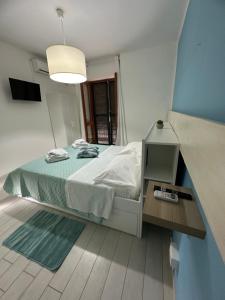 Postel nebo postele na pokoji v ubytování B&B Phistelia