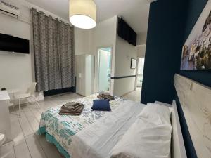Postel nebo postele na pokoji v ubytování B&B Phistelia + 8 fotografií