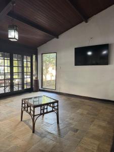 Μια τηλεόραση ή/και κέντρο ψυχαγωγίας στο Casarão Pé na Areia