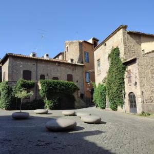 a group of rocks sitting in the middle of a street at Boccaletto Incantato in Viterbo