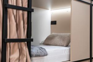 Postel nebo postele na pokoji v ubytování Albergue San Nicolás
