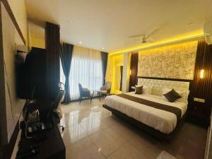 Letto o letti in una camera di Mysore Elite