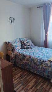 Postel nebo postele na pokoji v ubytování AlohaT Habitaciones