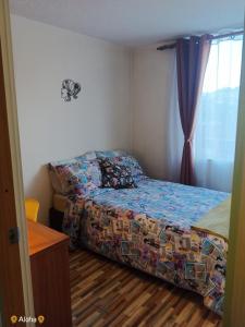Postel nebo postele na pokoji v ubytování AlohaT Habitaciones