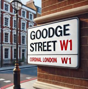 a sign that reads goodridge street w on a brick building at Studio flat in Fitzrovia in London
