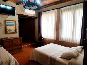 Postel nebo postele na pokoji v ubytování Estudio El Tosca