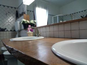 Koupelna v ubytování B&B La Piuma