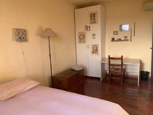 Postel nebo postele na pokoji v ubytování B&B La Piuma