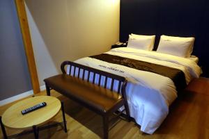 Postel nebo postele na pokoji v ubytování Forest 701 Hotel
