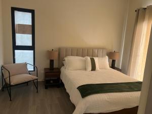 Ένα ή περισσότερα κρεβάτια σε δωμάτιο στο cozy apartment +16 φωτογραφίες