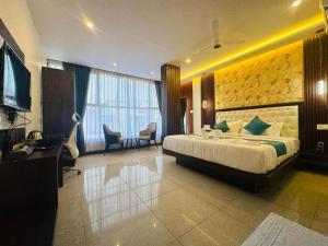 Letto o letti in una camera di Mysore Elite